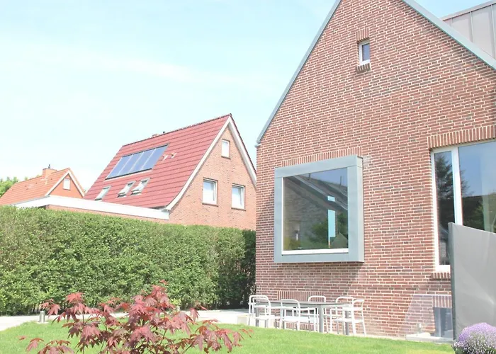 Фото Sommerloft Norderney Ferienhaus