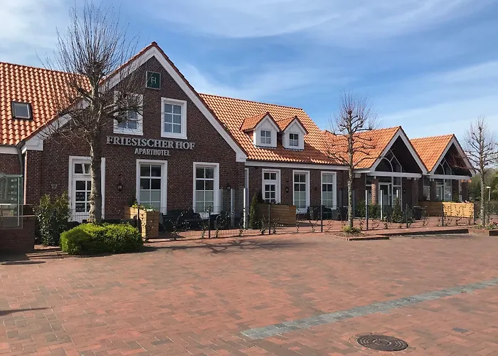 Photo de Friesischer Hof, Ferienwohnungen Mit Indoor Spielplatz, Kostenfreien Parkplatz Und W-Lan Hage