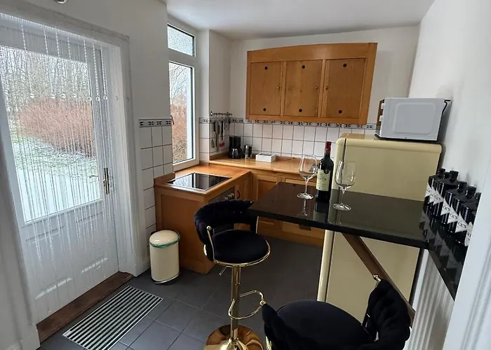 Фото Whisperwood Apartment Colnrade